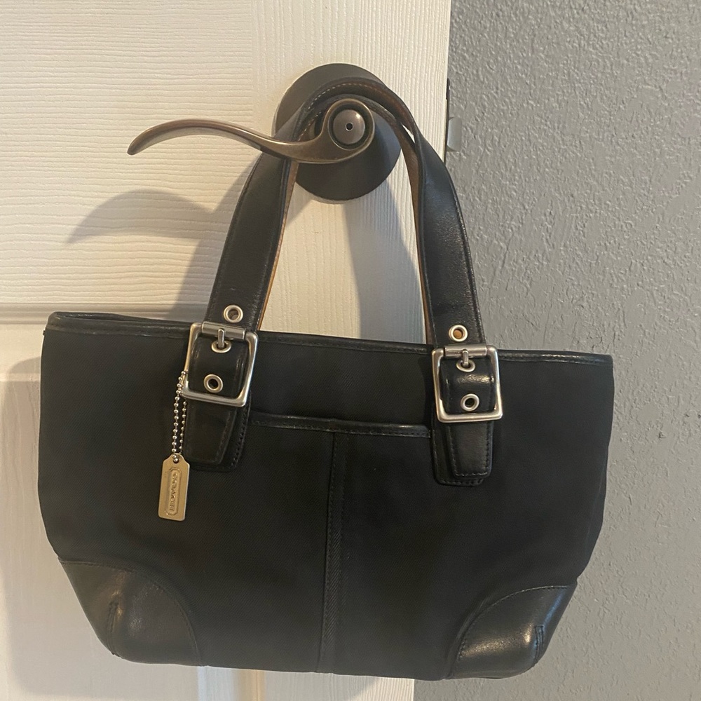 Coach. Small black bag. Rarely used.